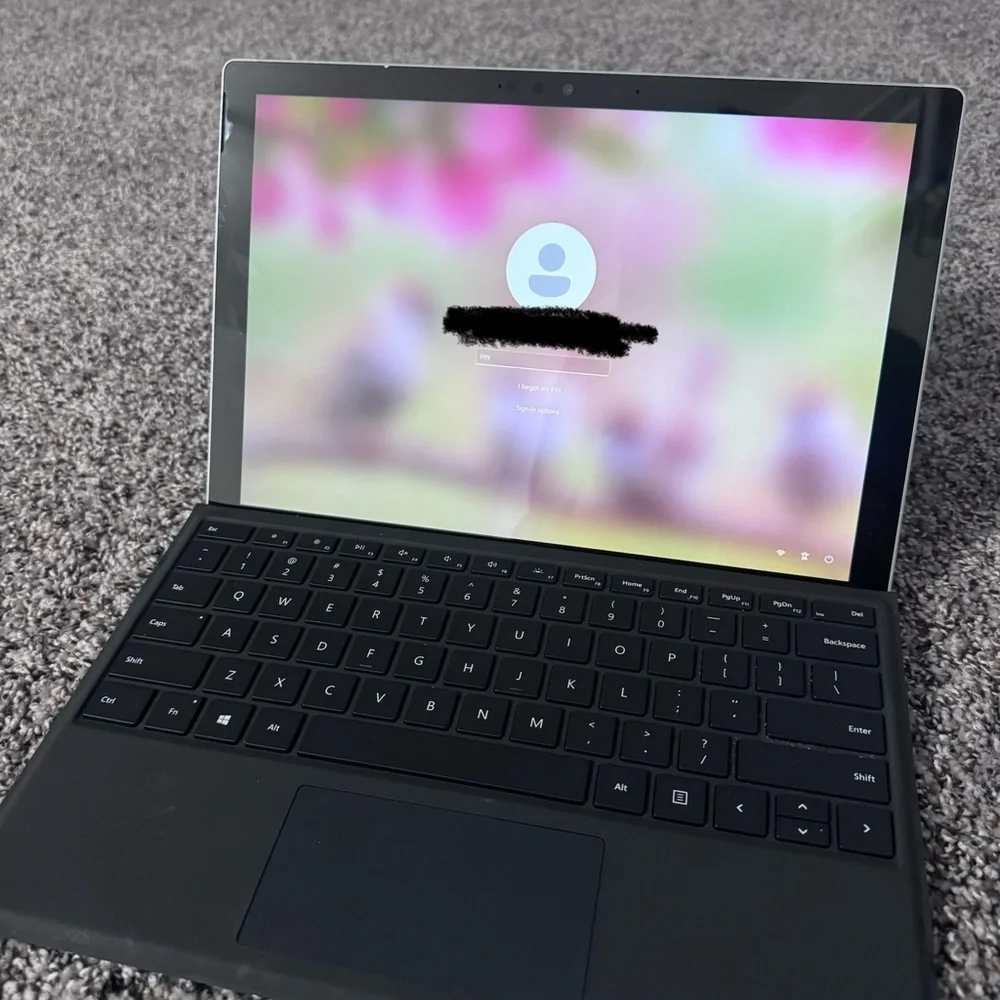 Microsoft Surface Pro 7 tablet in Silver with charger & keyboard